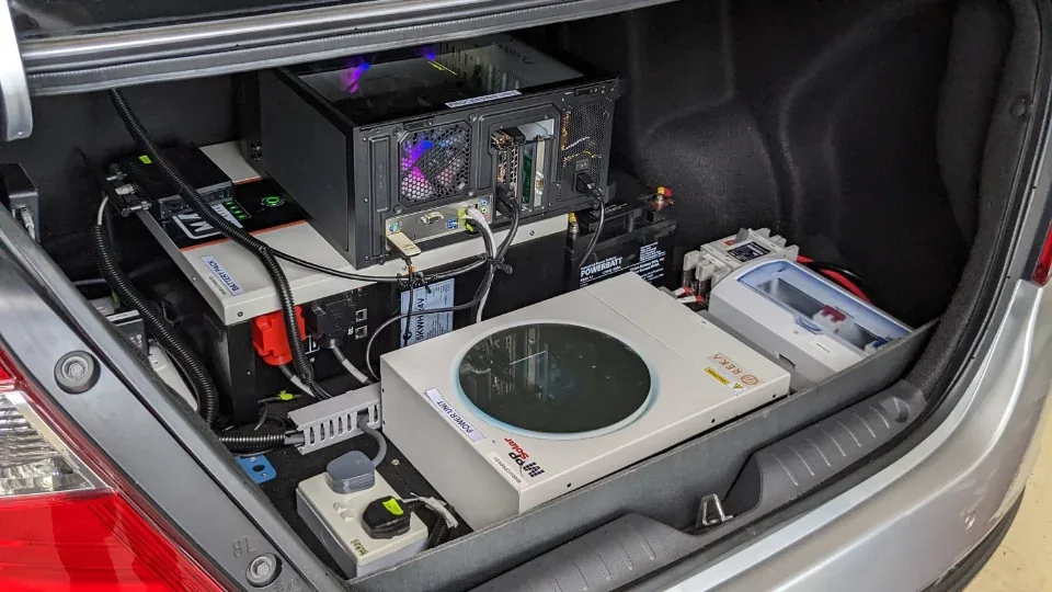 REKA archive photograph. Actual vehicle computing rack at Malaysia Autoshow 2023; not a telematics installation