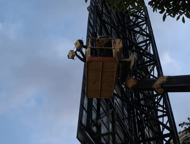 Traffic-sensing hardware fixed high on a steel tower
